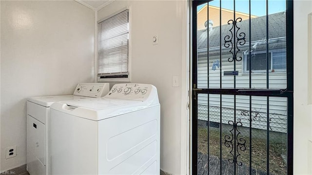 laundry area with washing machine and clothes dryer