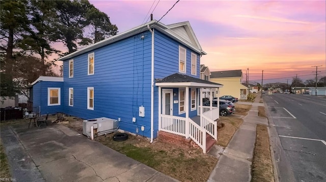 view of property exterior at dusk