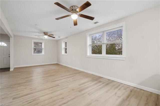 unfurnished room featuring light wood-type flooring