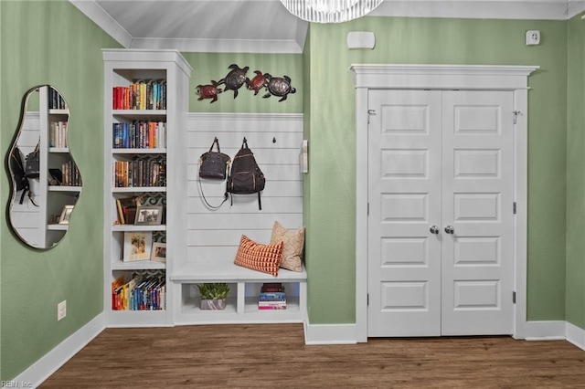 mudroom featuring dark hardwood / wood-style flooring and crown molding