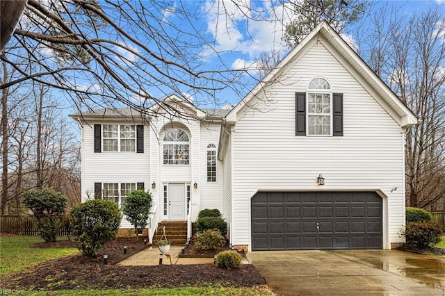 view of front of property with a garage