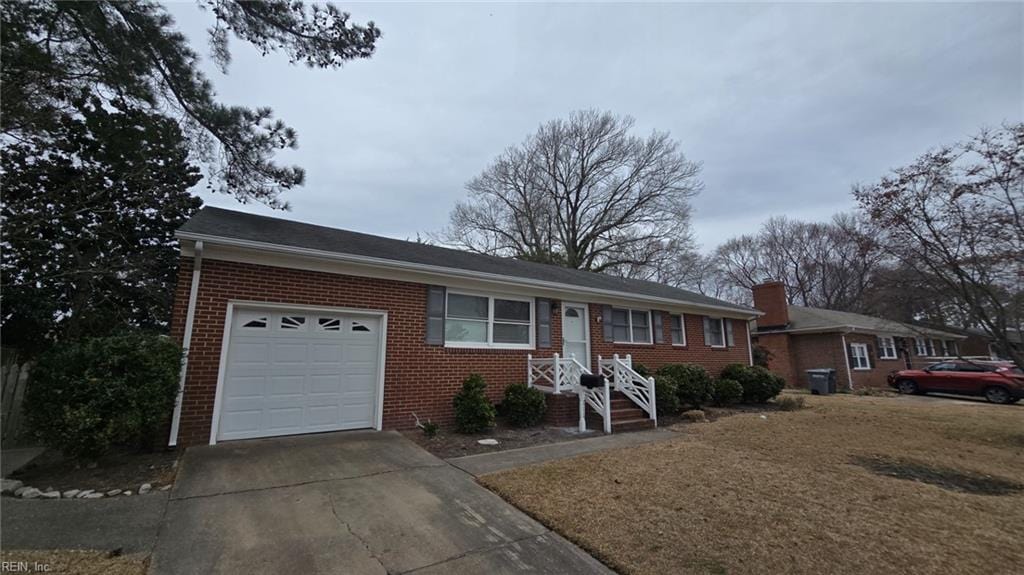 single story home featuring a garage