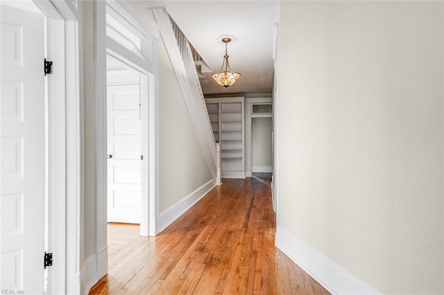 hall with light hardwood / wood-style flooring