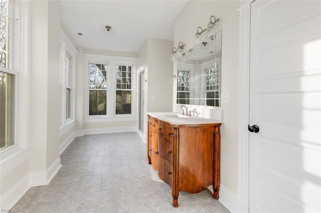 bathroom featuring vanity and plenty of natural light