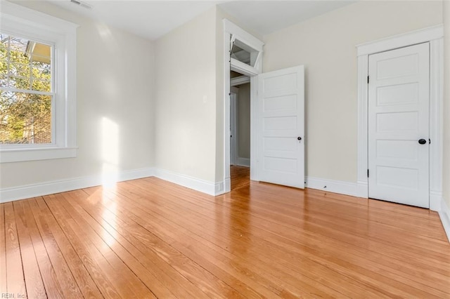 unfurnished bedroom featuring light hardwood / wood-style floors