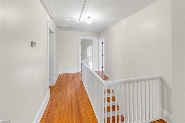 corridor featuring light hardwood / wood-style flooring