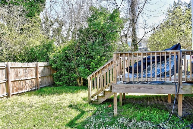 view of yard featuring a wooden deck