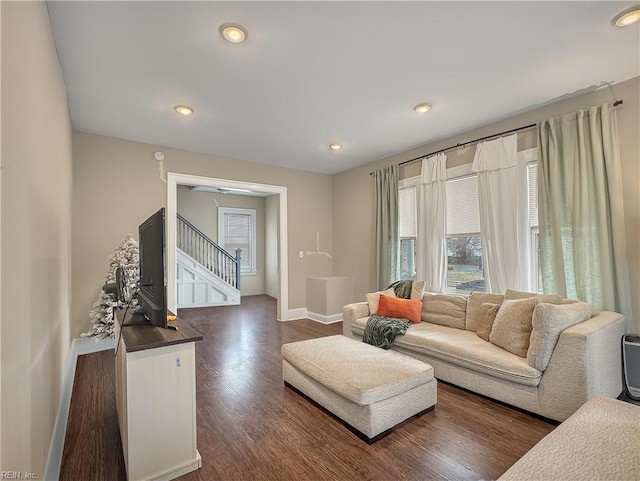 living room featuring dark hardwood / wood-style flooring