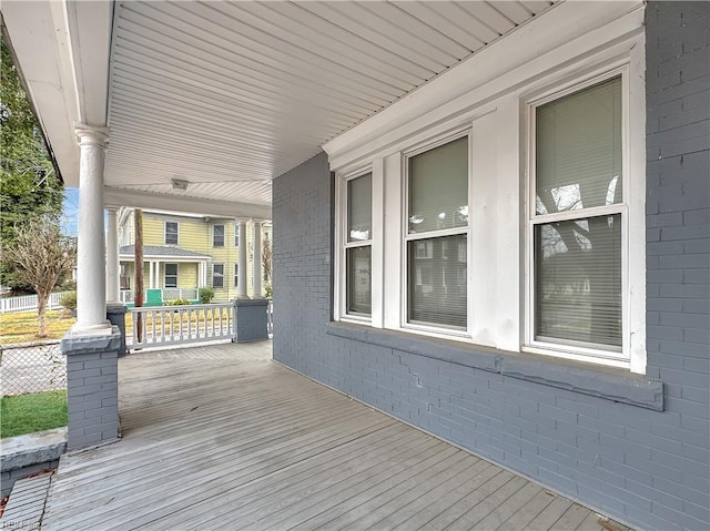 wooden deck featuring covered porch