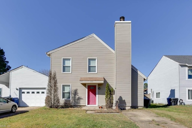 front of property featuring a garage and a front yard