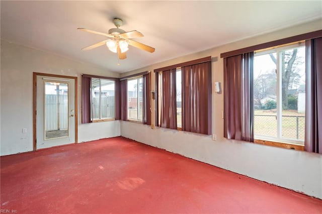 carpeted empty room with ceiling fan