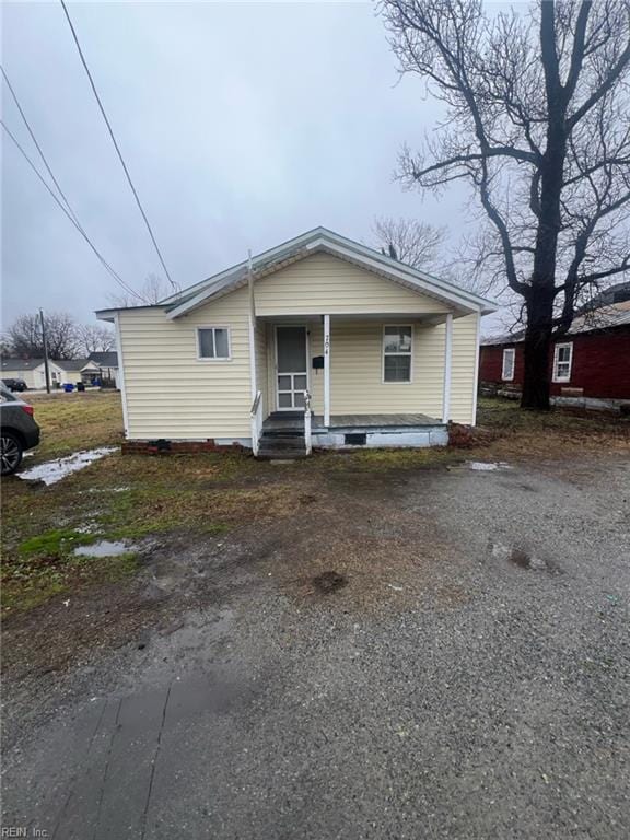 bungalow-style home with covered porch