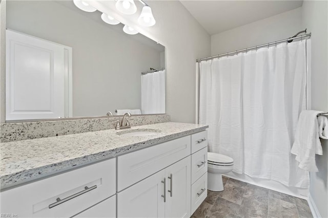 full bathroom featuring vanity, shower / bath combo, and toilet