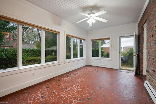 unfurnished sunroom featuring baseboard heating and ceiling fan