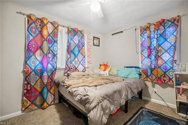 carpeted bedroom featuring ceiling fan