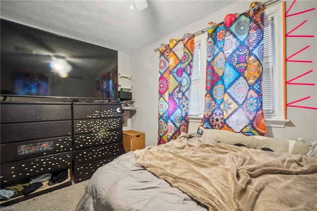 bedroom featuring carpet and ceiling fan