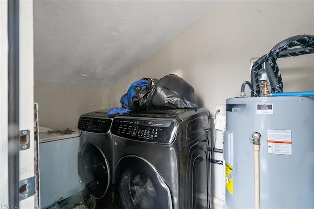 laundry area featuring independent washer and dryer and water heater