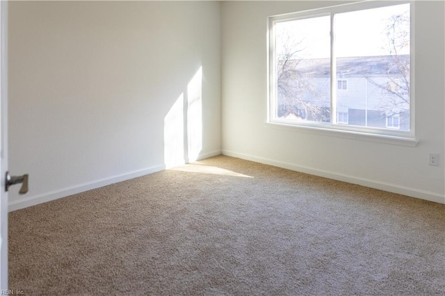 view of carpeted spare room