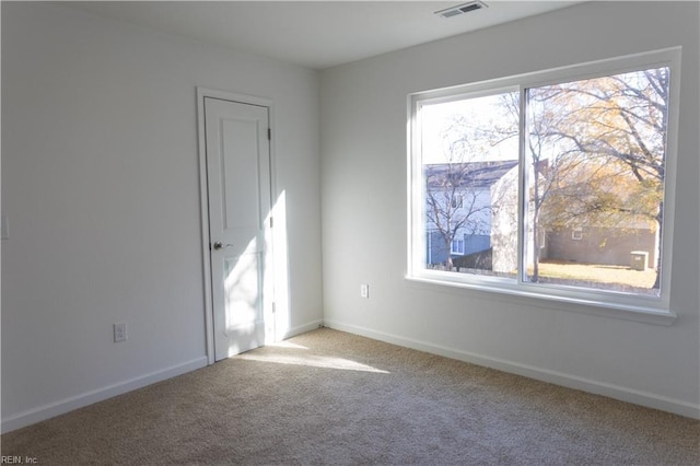 view of carpeted spare room