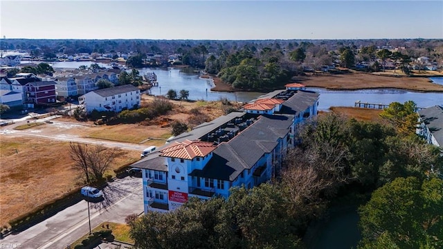 drone / aerial view with a water view