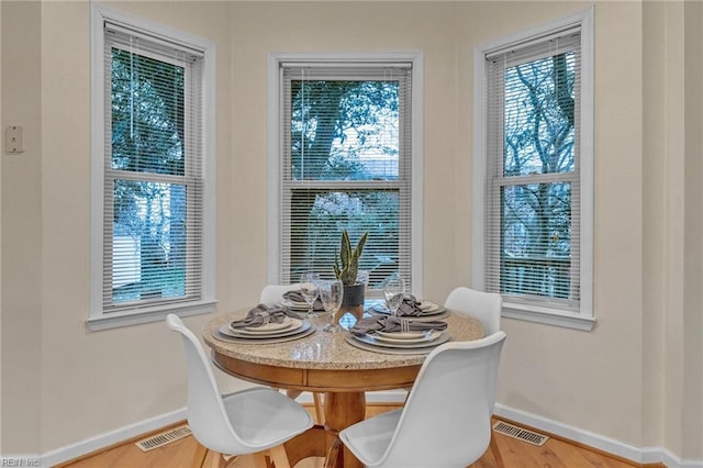 dining room featuring light wood-type flooring