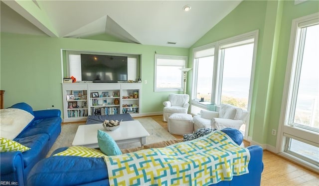 sunroom with vaulted ceiling