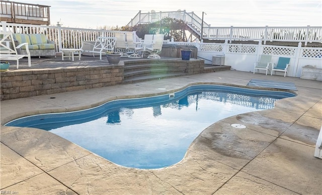 view of pool featuring a patio area