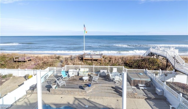 property view of water featuring a beach view