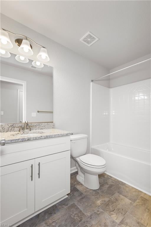 full bathroom with vanity, toilet, and shower / bath combination