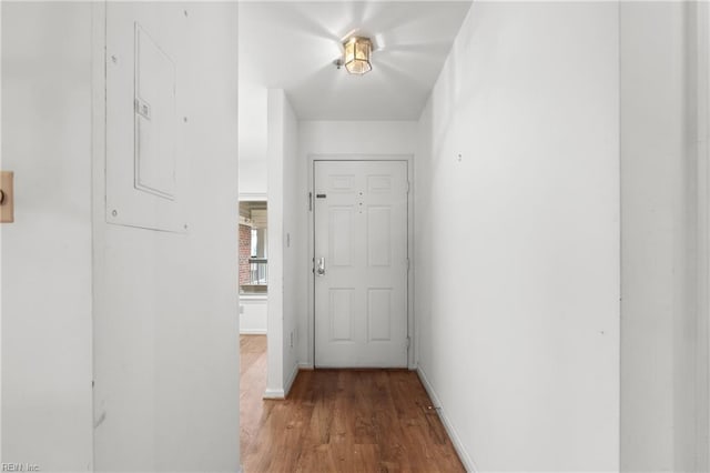 hallway featuring hardwood / wood-style floors