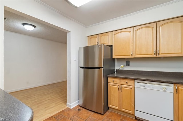 kitchen featuring stainless steel refrigerator, dishwasher, ornamental molding, light brown cabinets, and a textured ceiling