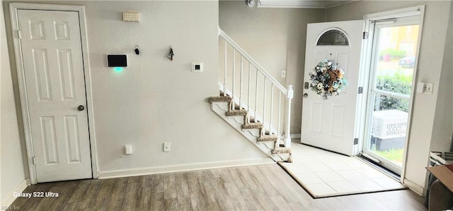 foyer entrance featuring wood-type flooring