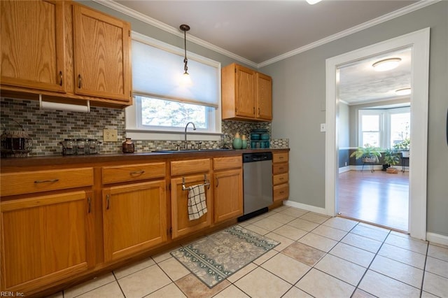 kitchen with light tile patterned floors, sink, crown molding, dishwasher, and hanging light fixtures