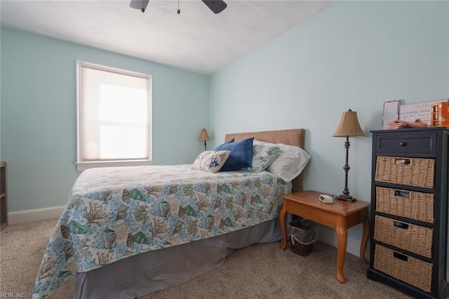 carpeted bedroom featuring lofted ceiling and ceiling fan