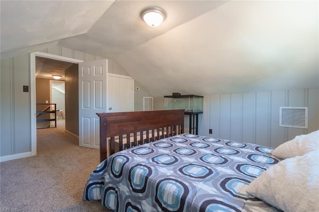 carpeted bedroom featuring lofted ceiling