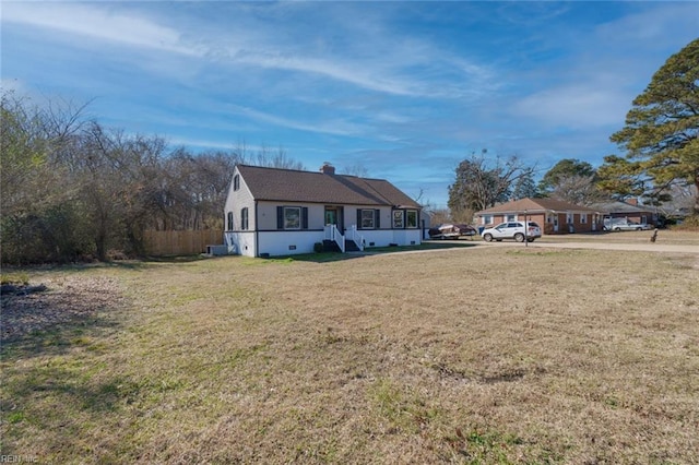 view of front of home with a front lawn