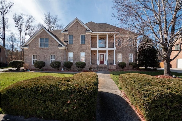 view of front of property with a front lawn