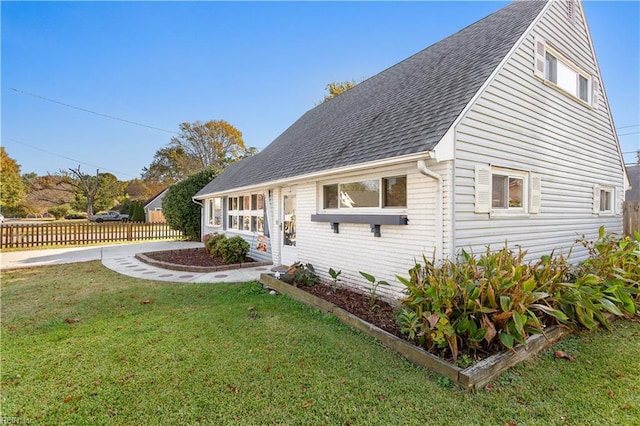 view of front of home with a front yard