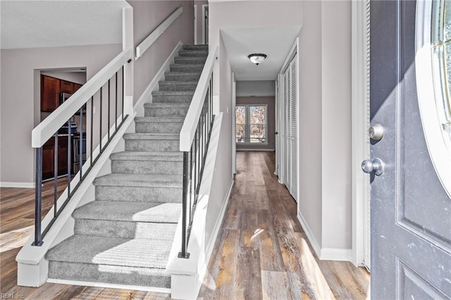 entrance foyer with hardwood / wood-style floors