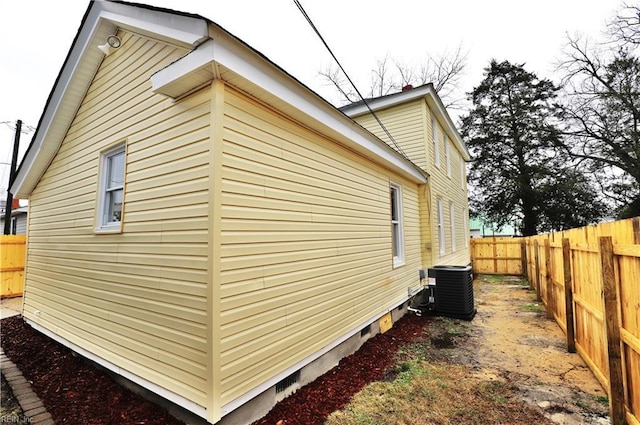 view of home's exterior with central air condition unit