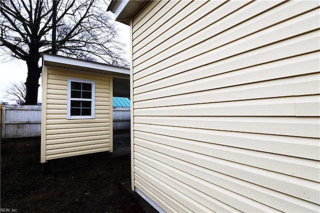 view of home's exterior featuring a storage shed