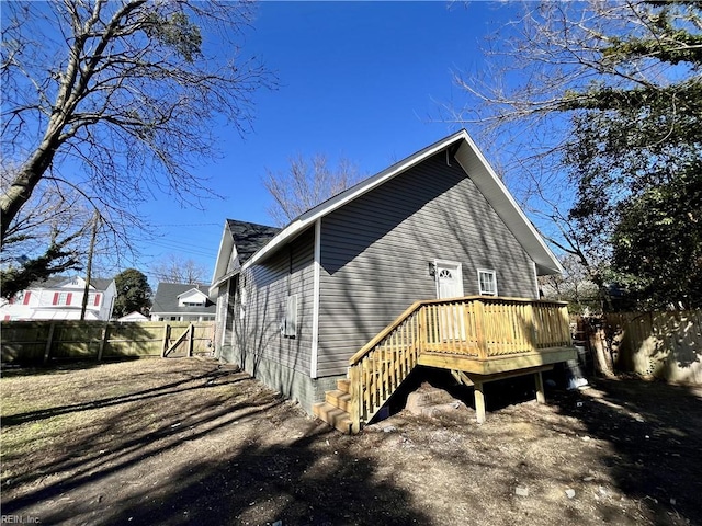 view of home's exterior with a deck