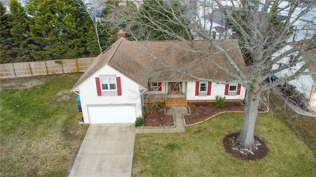 view of front facade featuring a front yard and a garage