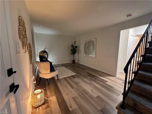 living area featuring hardwood / wood-style flooring