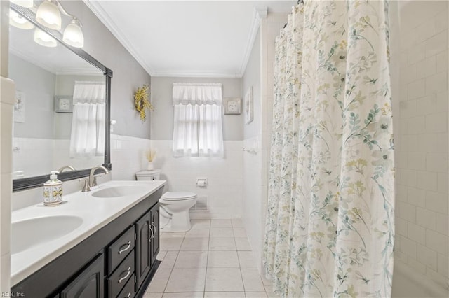 bathroom featuring crown molding, tile patterned flooring, tile walls, vanity, and toilet