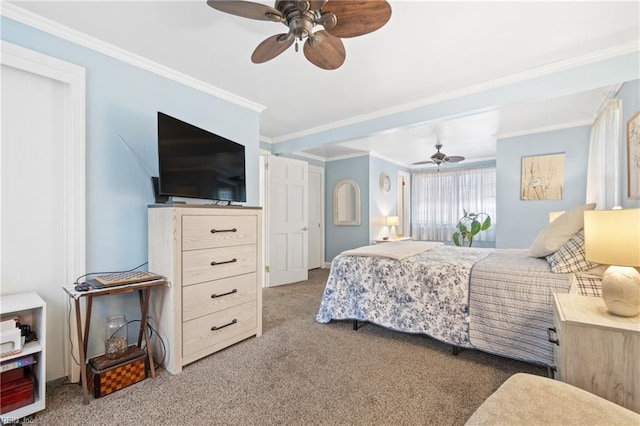 carpeted bedroom featuring crown molding and ceiling fan