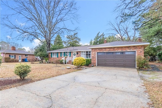 single story home featuring a garage