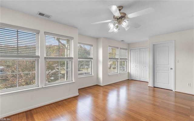 interior space featuring ceiling fan and light hardwood / wood-style floors