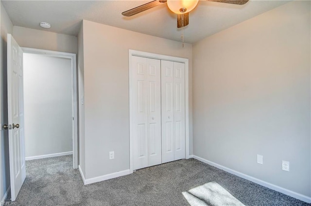 unfurnished bedroom with a closet, ceiling fan, and carpet