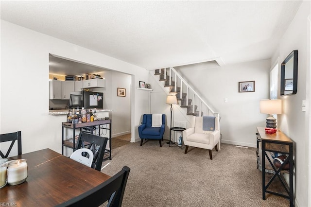 view of carpeted dining room